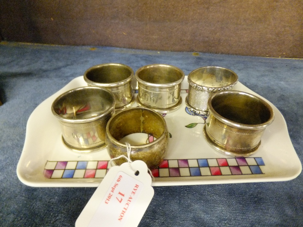 A group of six assorted silver napkin rings