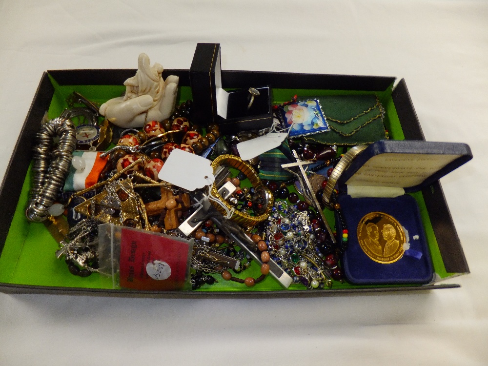 A mixed selection of badges and pendants to include the Catholic Women's League, a bronze coin