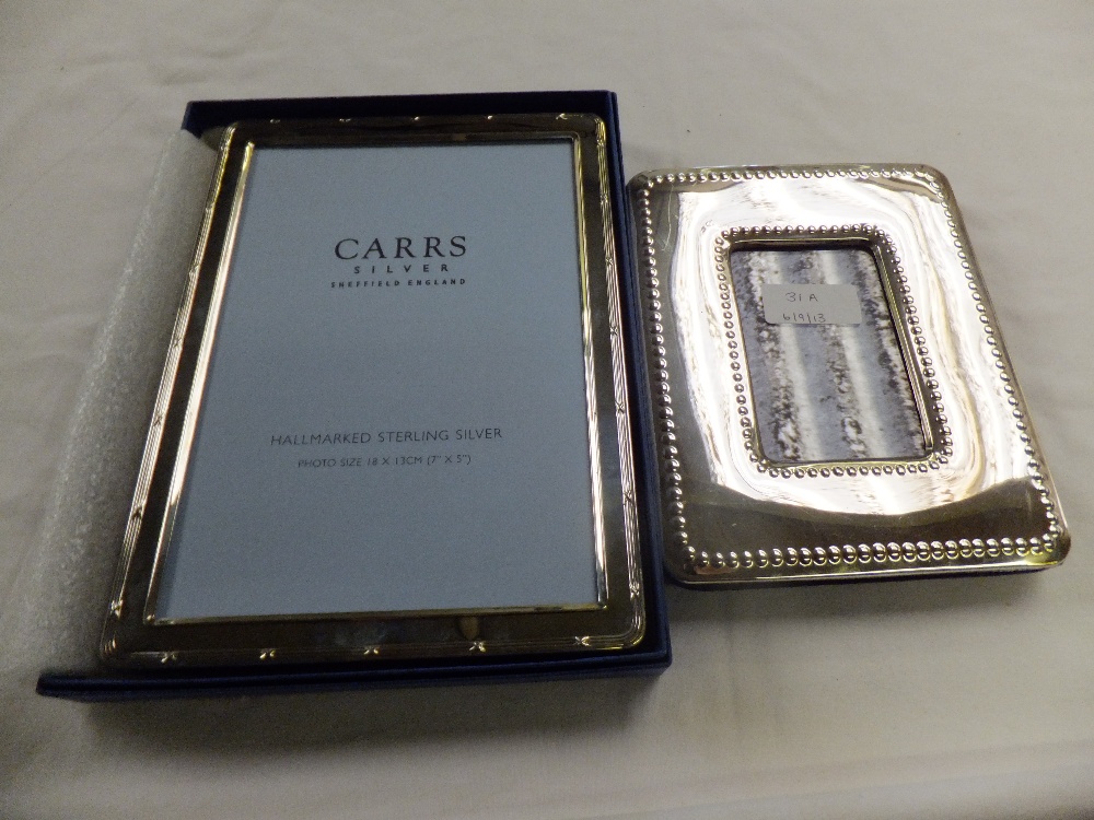 Two silver photo frames, both hallmarked