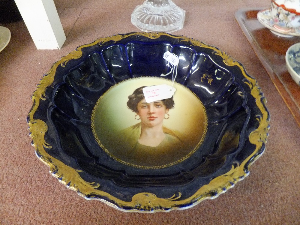 A Bavarian shallow bowl having cobalt blue and gilt decoration with female pictorial panel