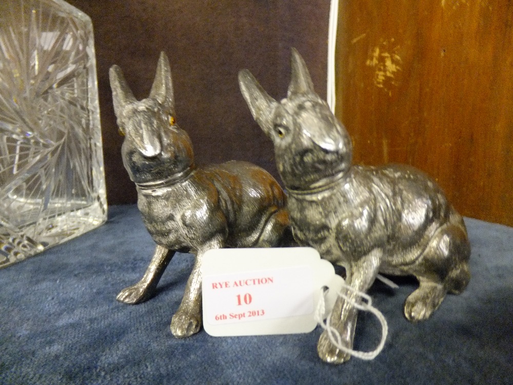 A pair of silver plated rabbit condiments