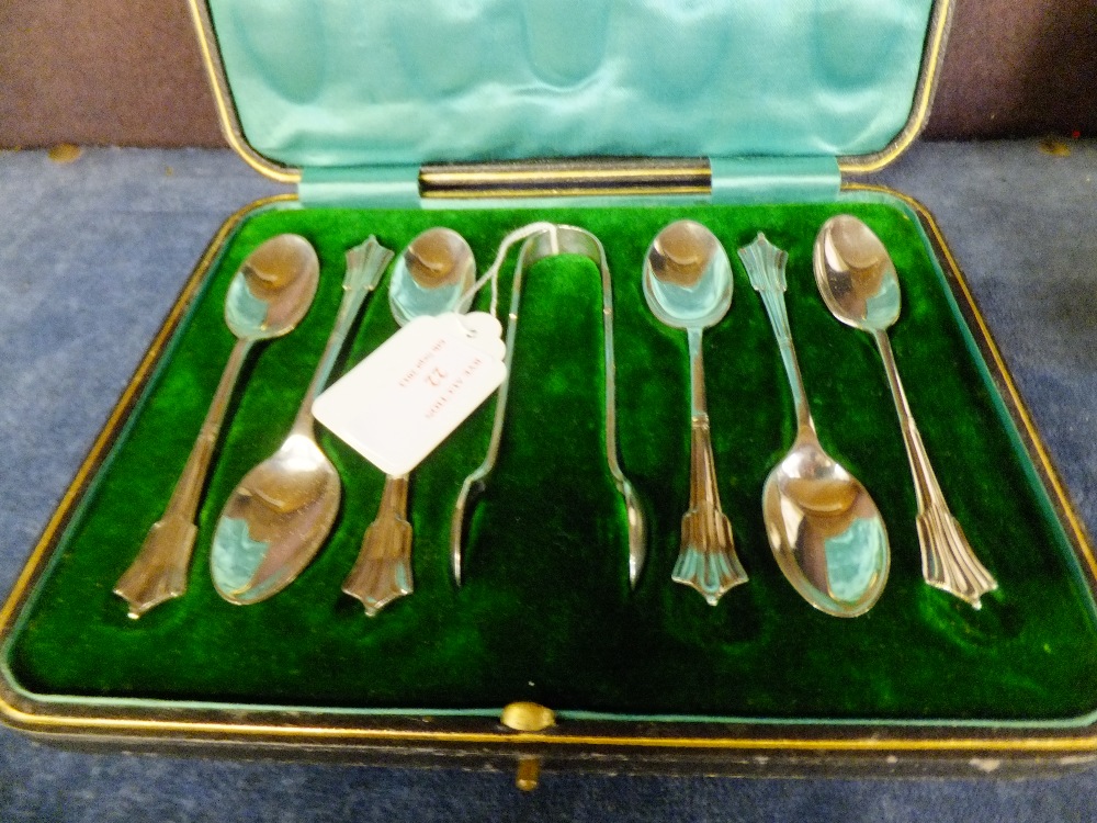 A boxed set of six silver spoons