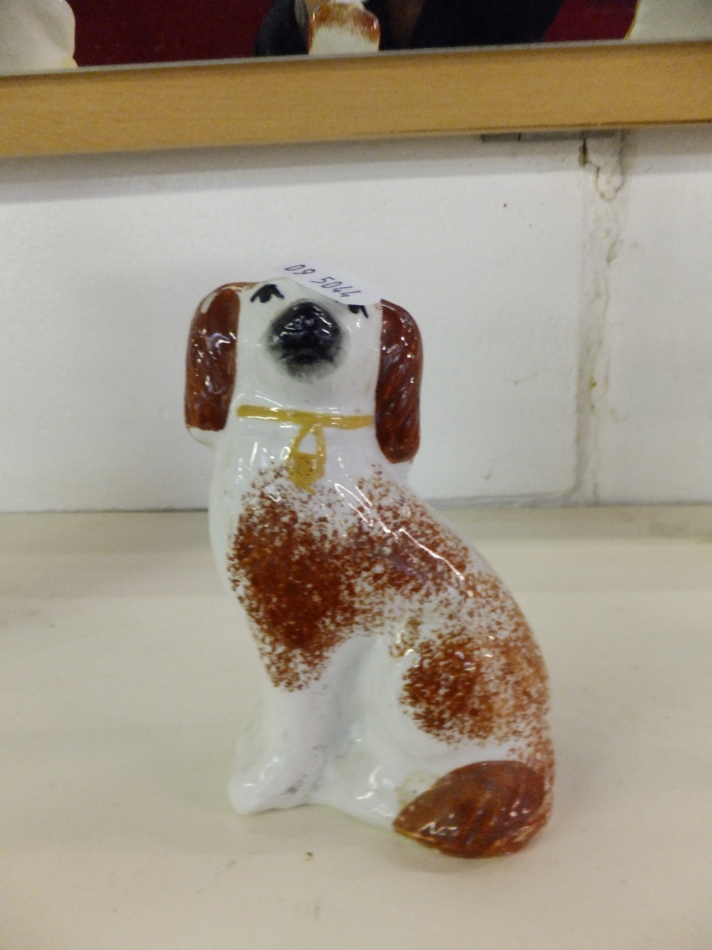 A Staffordshire figure of a spaniel