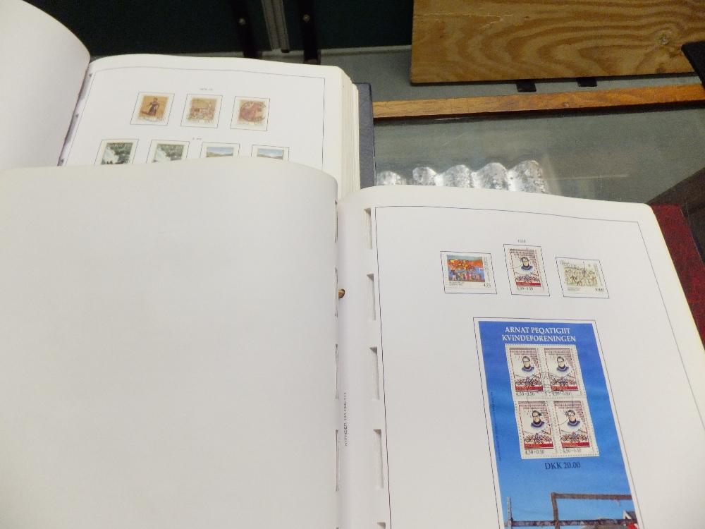 Two stamp albums containing stamps from Norway and Greenland