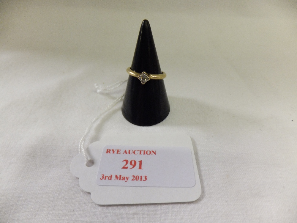 A 9ct gold ring inset with single solitaire diamond, size K