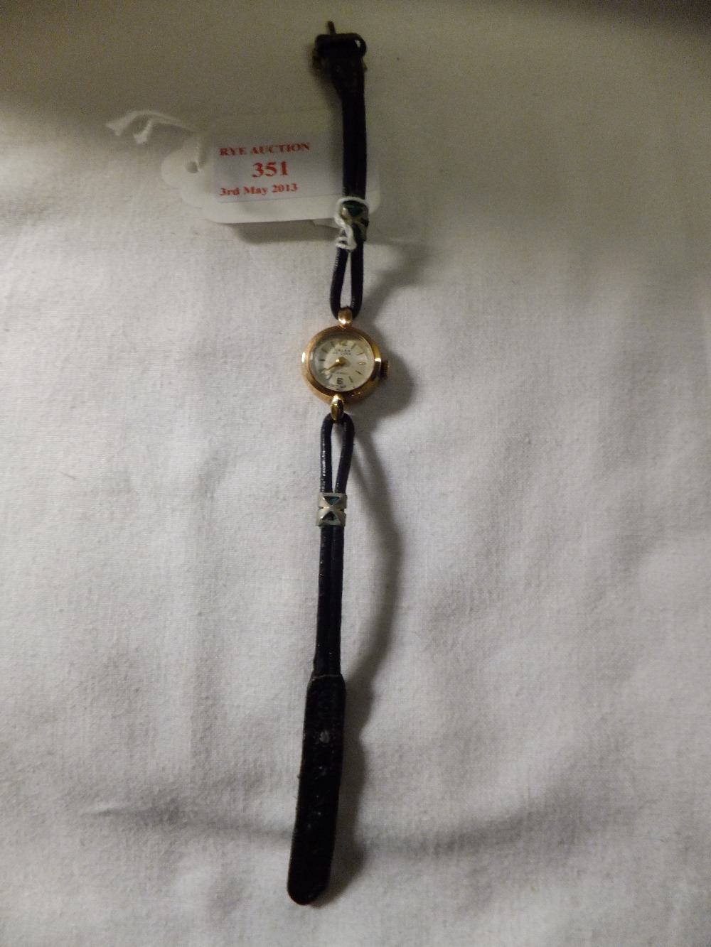 A ladies 14ct gold Valex De Luxe wristwatch with leather strap