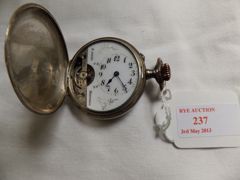 A silver cased pocket watch