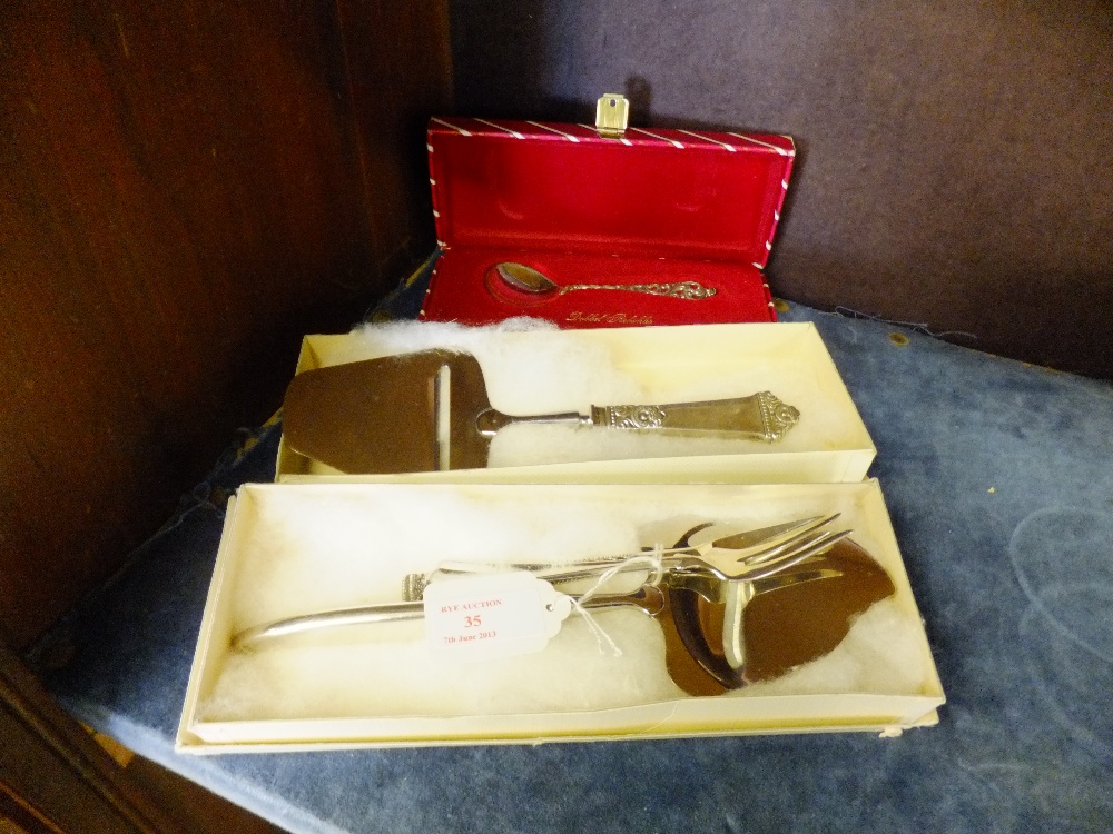 A collection of Norwegian 830 silver to include two cheese slicers, two pickle forks and a boxed jam