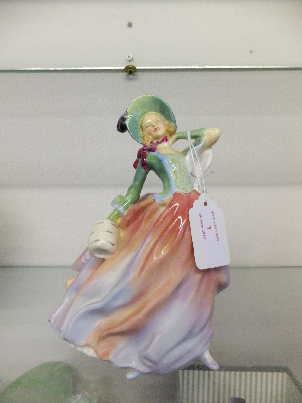 A  Royal Doulton figurine "Autumn Breezes" Green and Pink H.N. 1911