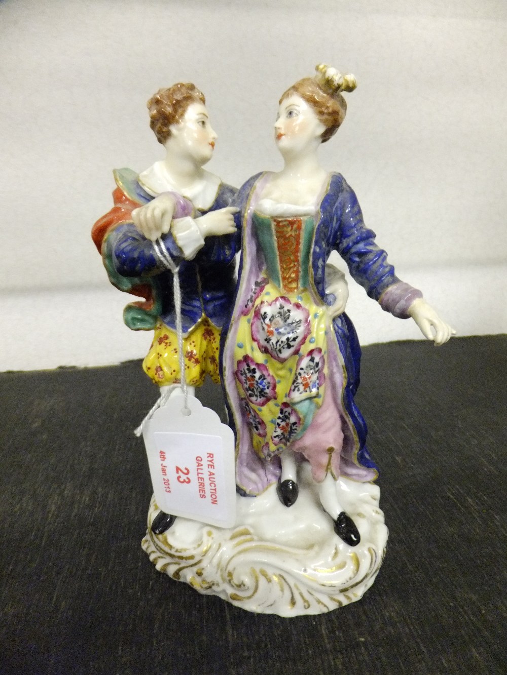 A Royal Crown Derby porcelain figurine male and female dancing, 6.5" high