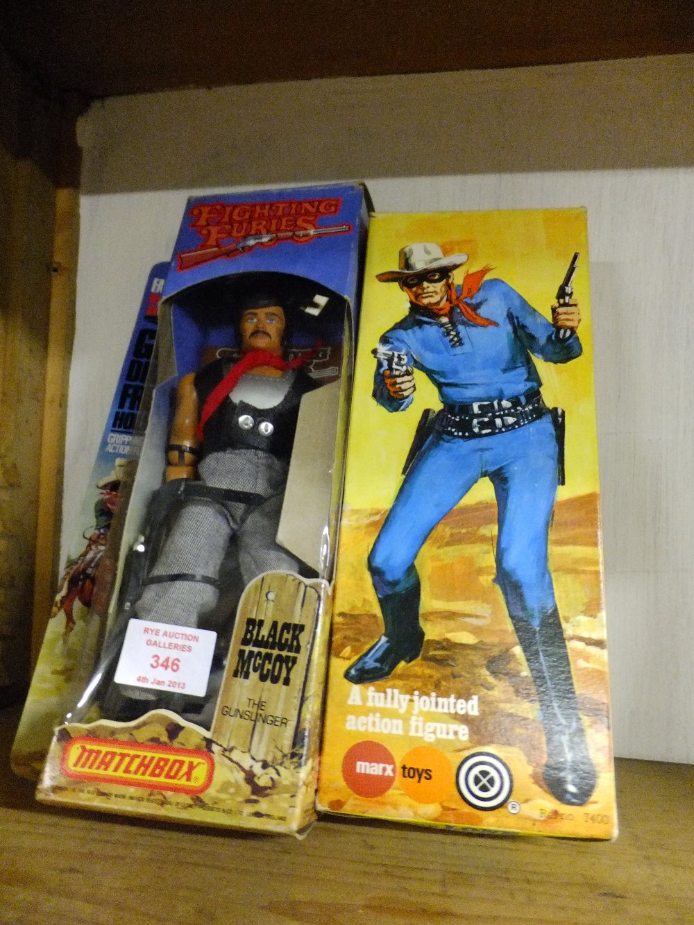 A Matchbox figure of 'Black McCoy' and a Marx Toys figure of 'Lone Ranger, both boxed