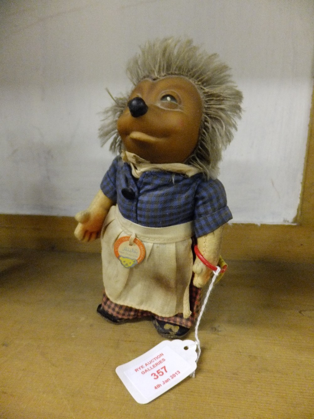A c1960 Steiff Micki Mummy hedgehog with original card and wrist tag having label and button