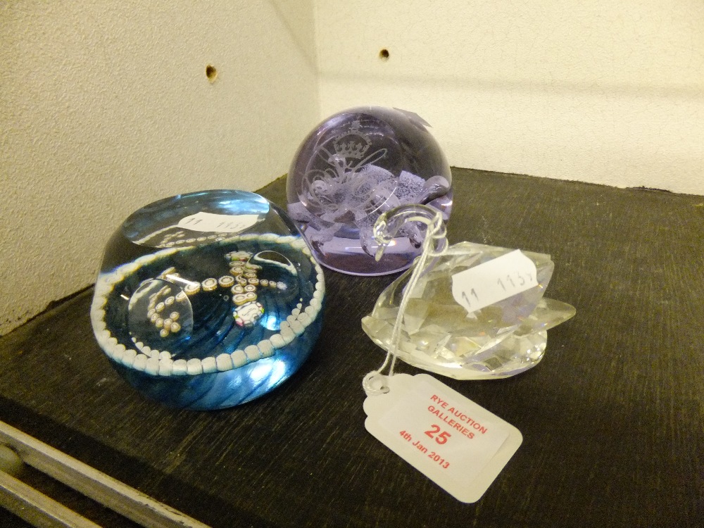 Two Royal Wedding Caithness paperweights; an anchor and moonflower, and a crystal swan