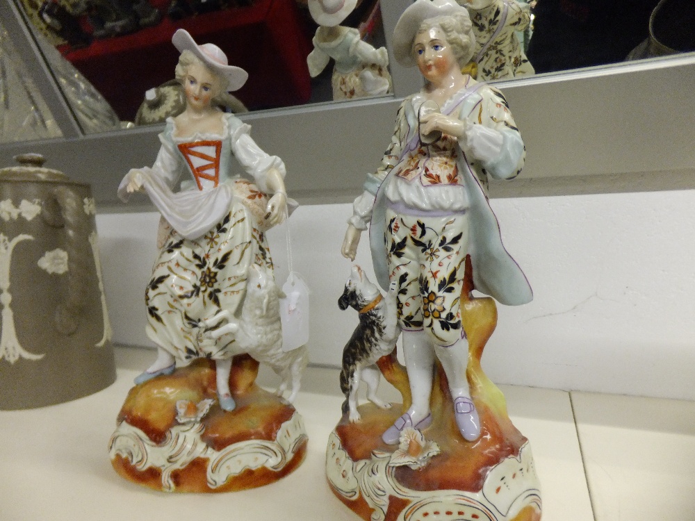 A pair of Meissen figurines of a shepherd and shepherdess 11" high, shepherd A/F