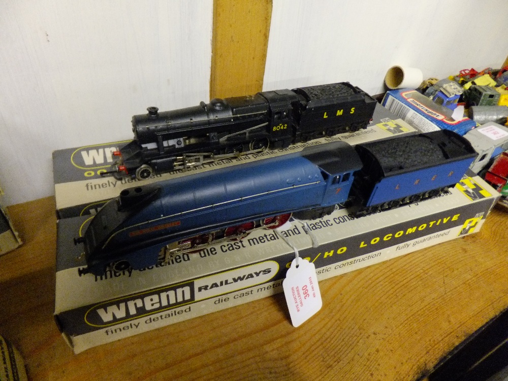 Two Wrenn OO gauge locomotives; W2212 4-6-2 Gresley LNER and W2225 2-8-0 8F freight LMS, both mint