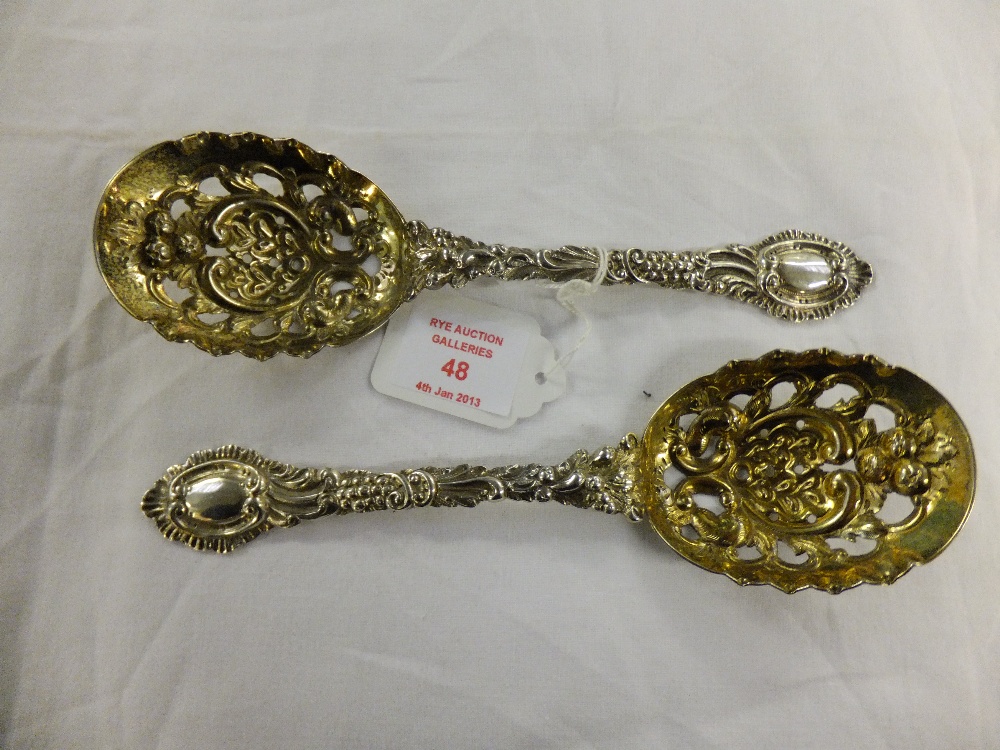 A pair of London 1895 silver Goldsmiths & Silversmiths Company's hallmarked silver gilt berry