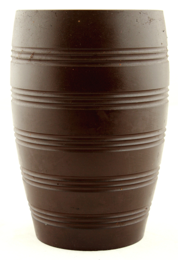 Property of a lady - Keith Murray for Wedgwood - a rare brown basalt vase with incised concentric