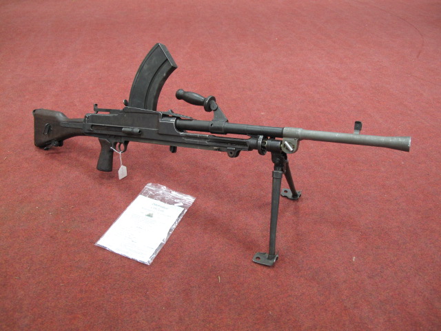 A WWII Bren Gun Light Machine Gun MkI, Canadian origin 0.303" calibre, serial no.6T4670, signs of