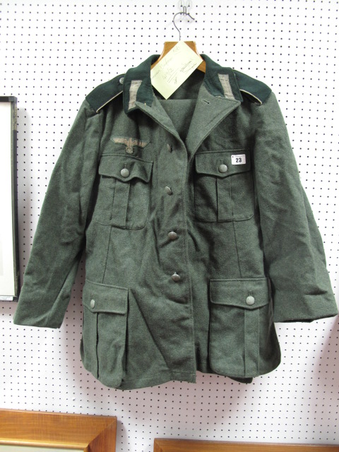 A WWII German Two-Piece Uniform, tunic and trousers in grey-green finish complete with buttons,