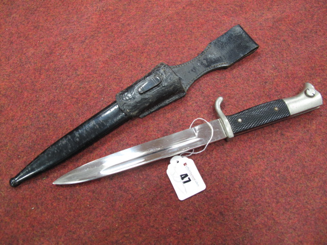 A 1930`s German Dress Bayonet, chequered black plastic grip secured by two rivets, plated quillon