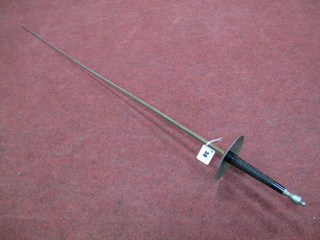 A XX Century Fencing Foil, overall length 110 cms, showing signs of age.