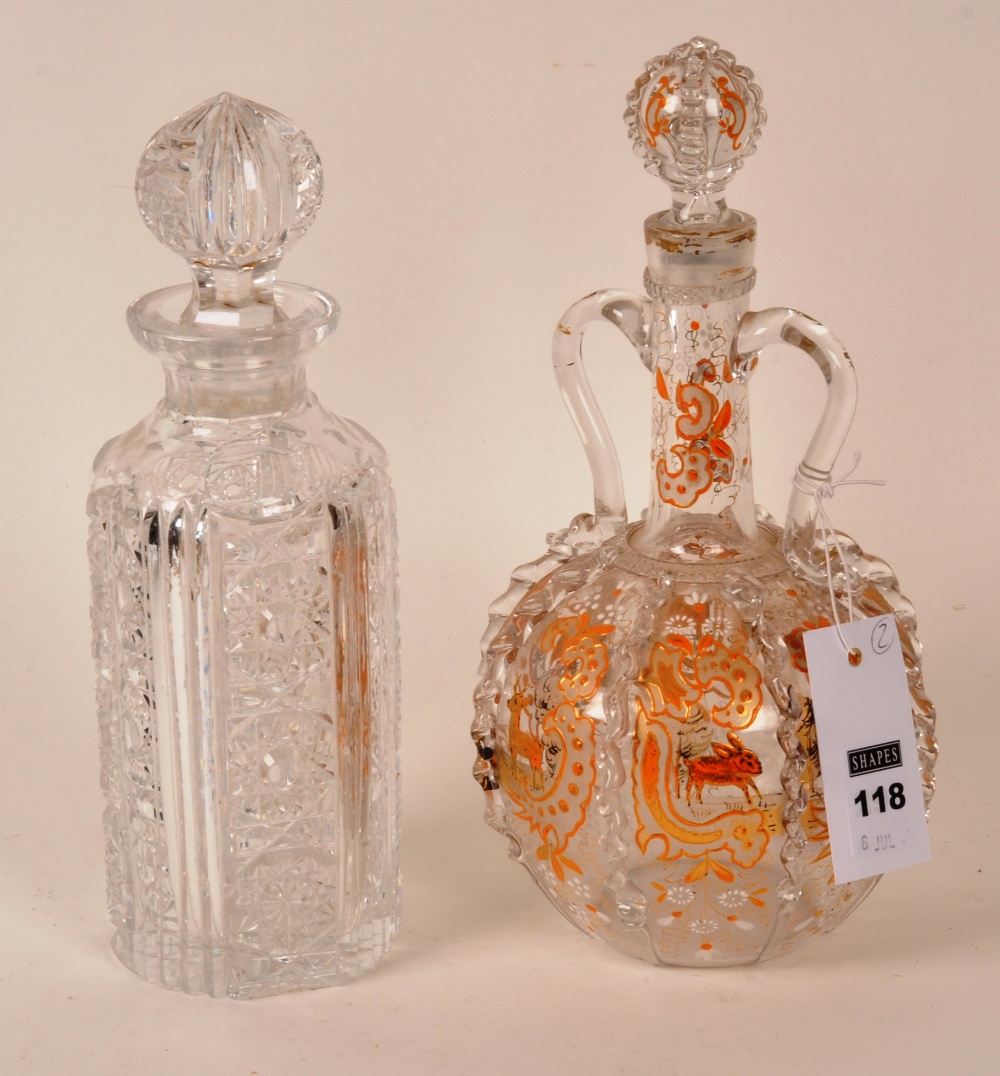 An unusual continental clear glass decanter and stopper, of globe and shaft form, with twin loop