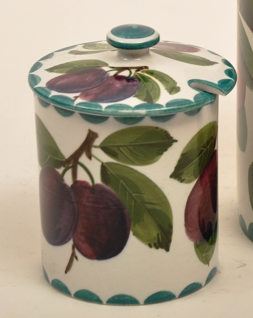 Wemyss jam pot and lid hand decorated in the plums pattern with green dentil borders, painted Wemyss