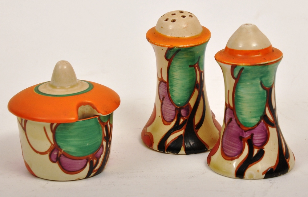 Clarice Cliff, Fantasque Bizarre range condiment set in the autumn balloon trees pattern