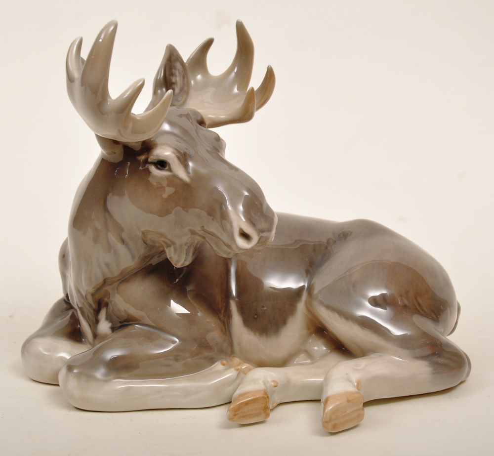 Royal Copenhagen figure of a Moose No.2813, modelled lying down by Knud Kyhn (hairline) 21 x 24cm