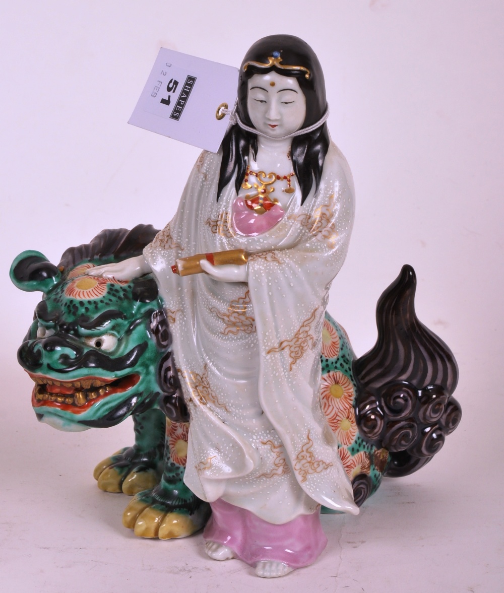 Chinese model of a Bejin and her Qilin in coloured enamels, 22cm high