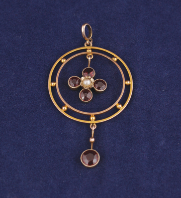 Victorian 9 ct. gold Art Nouveau garnet and seed pearl pendant