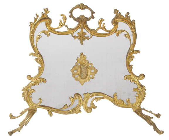 Nineteenth-century brass armorial fire screen raised on scroll ends 70 cm. wide