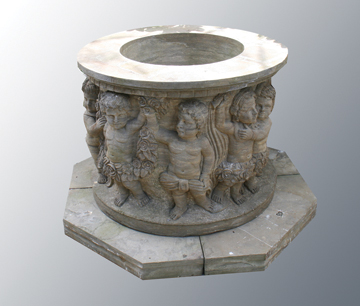 Italianate stone well head , with sculpted cherub frieze  97 cm. diameter; 104 cm. wide