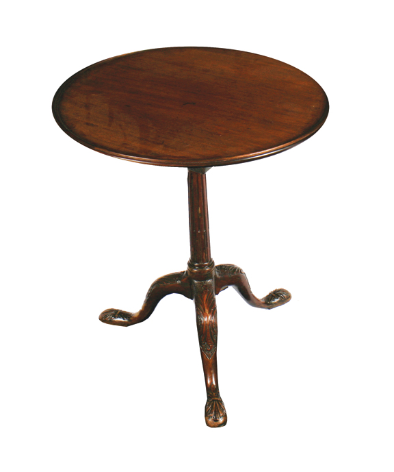 Irish George III period mahogany snap-top table, circa 1780, the circular dished top, raised on a