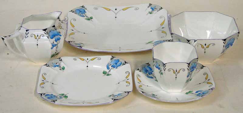 A Shelley Queen Anne 21-piece tea set with floral decoration, comprising six cups, six saucers,