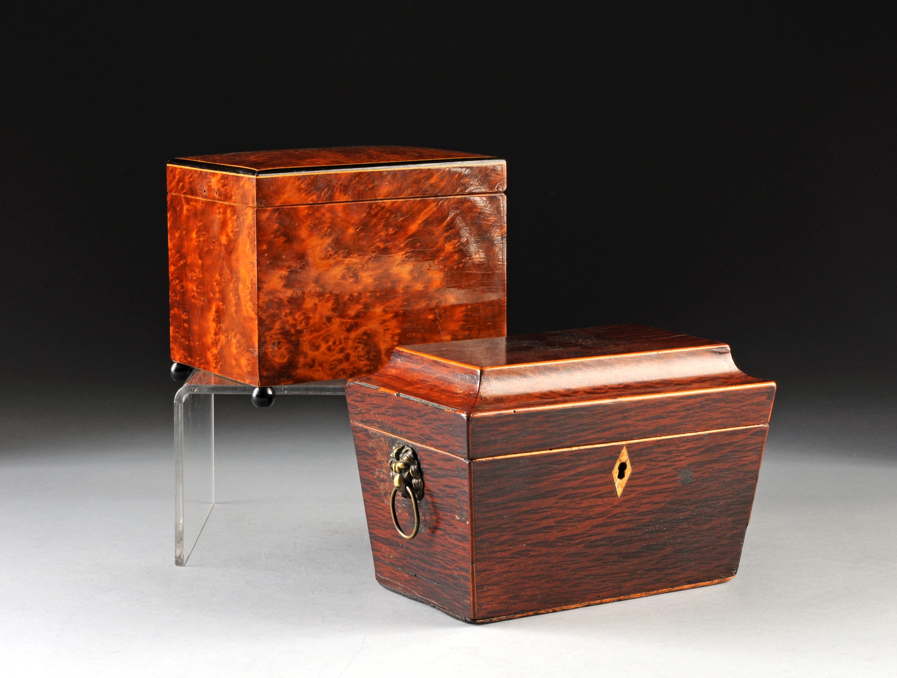 A REGENCY ROSEWOOD TEA CADDY AND AN AUSTRIAN BURL WOOD MUSICAL CIGARETTE BOX, 19TH AND 20TH