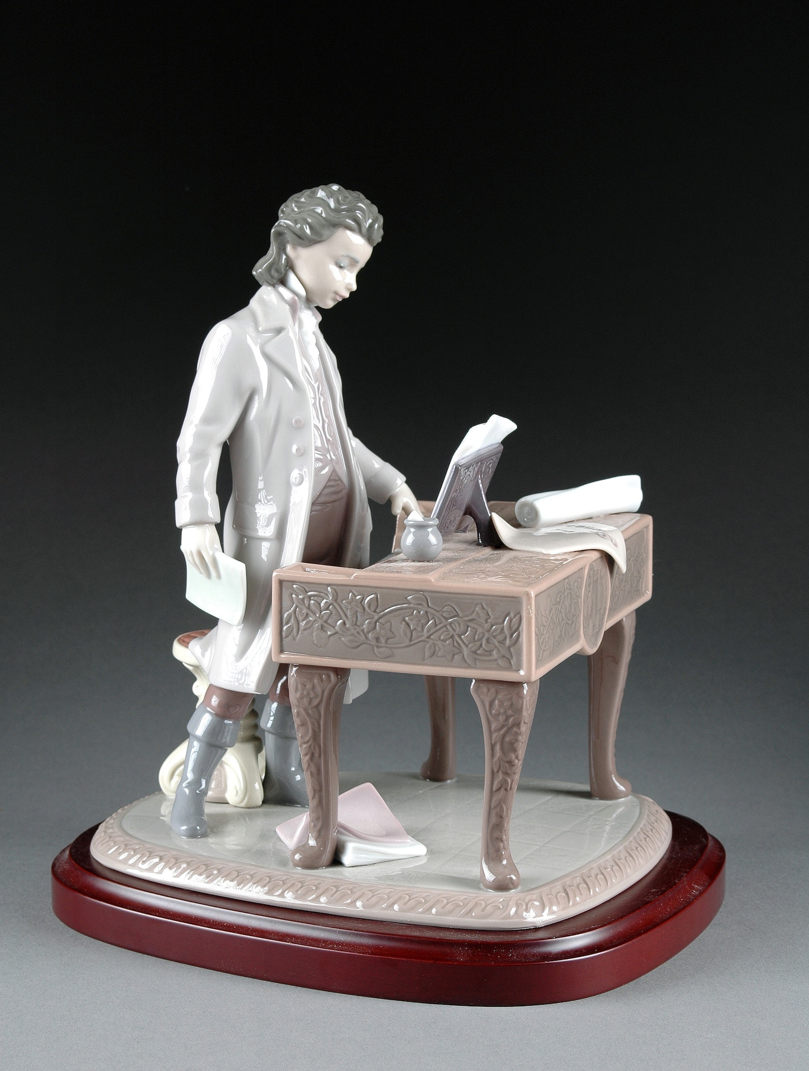 A LLADRO PORCELAIN FIGURAL SCULPTURE OF A YOUNG BEETHOVEN, 1996, modeled standing wearing period