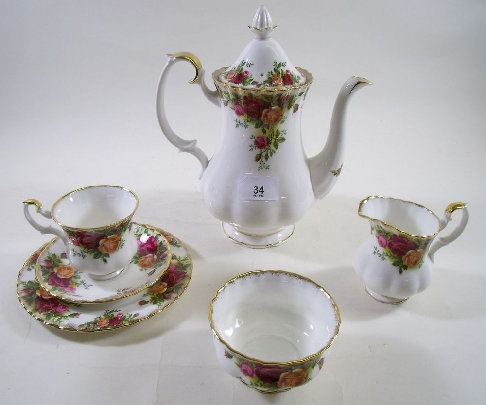 A Royal Albert forty five piece Country Roses dinner service comprising seven cups and saucers,a