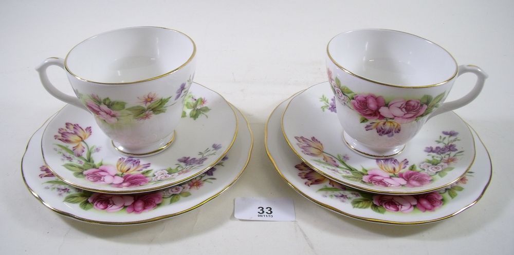 A Duchess teaset of six cups and saucers and six tea plates printed roses