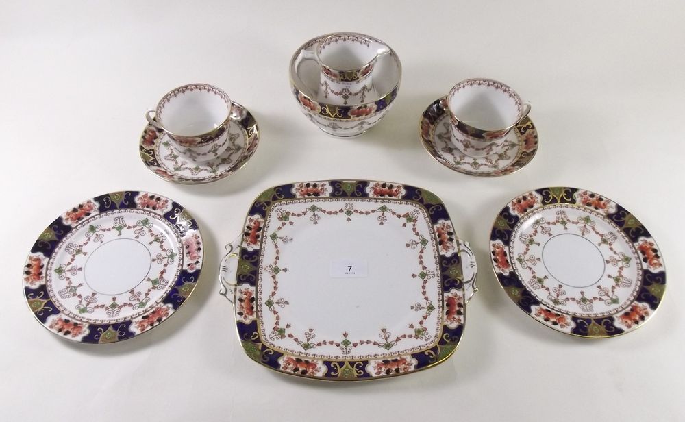 A 1920`s Royal Stafford teaset comprising: nine cups and eleven saucers, twelve tea plates, jug
