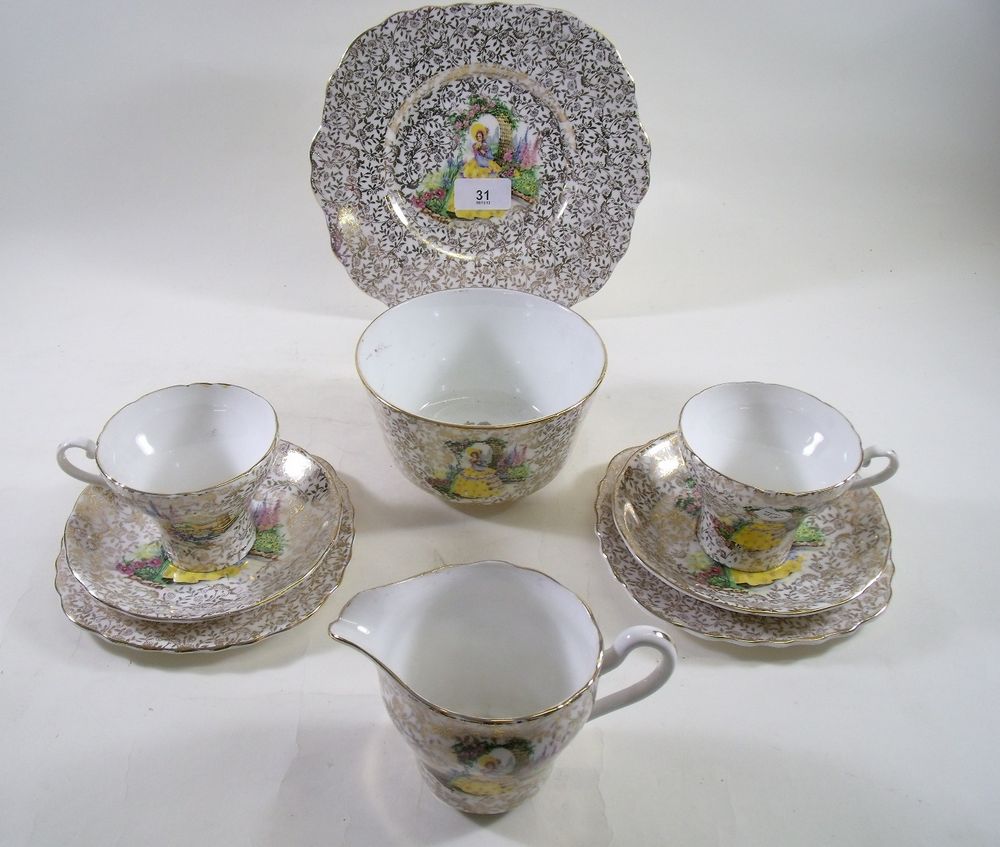 An Aynsley teaset printed crinoline lady comprising: six cups and saucers, six plates, two sugars,