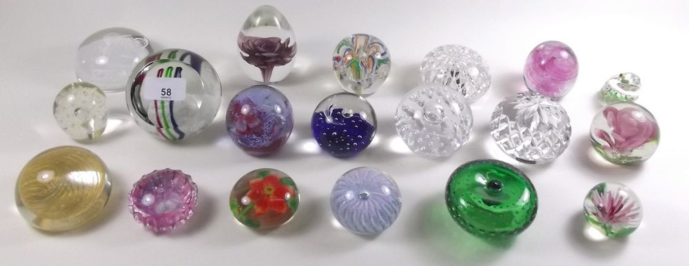 A quantity of paperweights