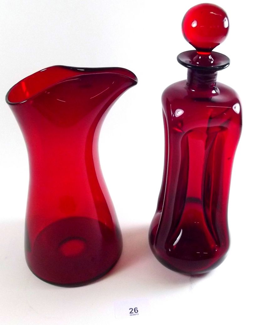 A Whitefriars style ruby jug and four section decanter