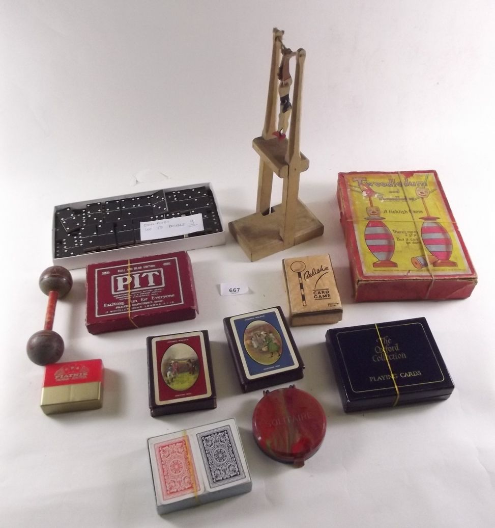 A group of old games and playing cards