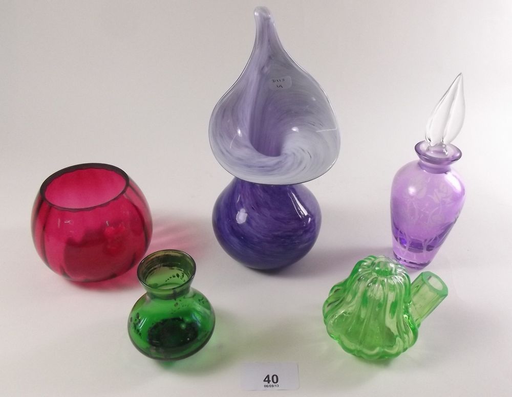 An Isle of Wight vase and other coloured glassware