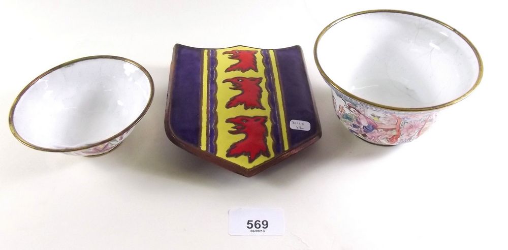 Two enamel bowls and an enamel shield decorated eagle heads