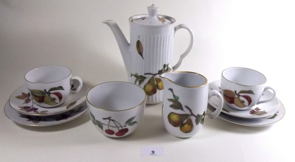A Royal Worcester coffee set comprising coffee pot, six cups and saucers, milk and sugar and six