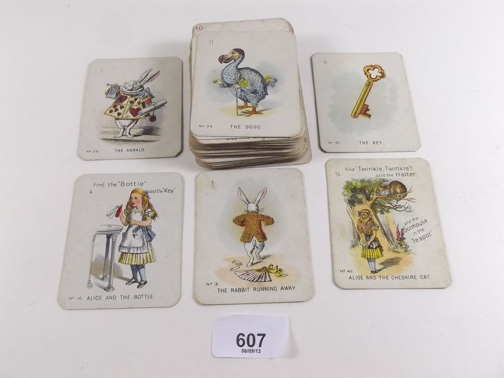 A set of forty eight Alice in Wonderland playing cards and a small group of similar Carreras cards