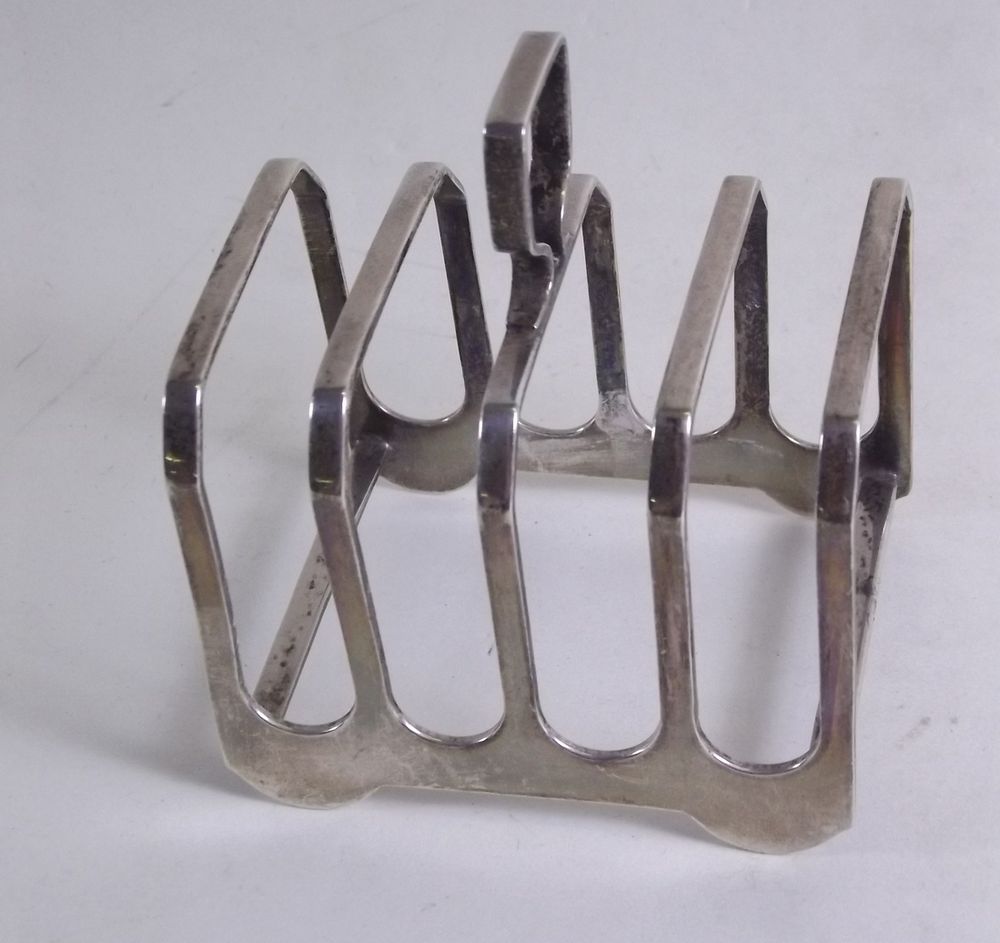 A silver toast rack by Elkington and Co, 3ozs