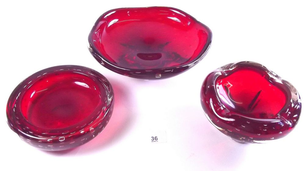 Two Whitefriars ruby bubbled glass dishes and an ashtray